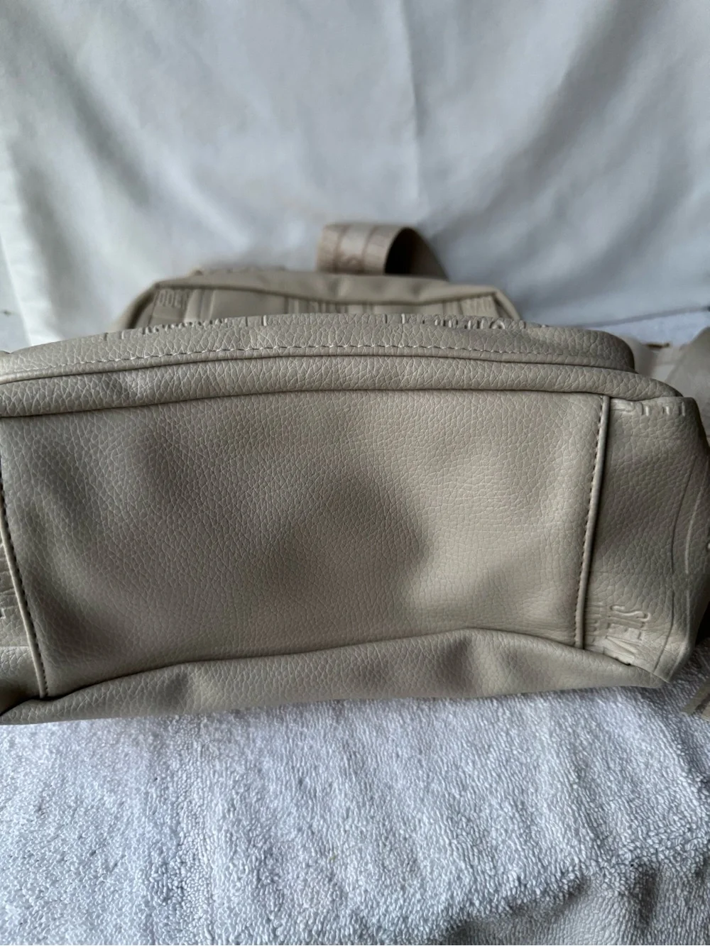 Steve Madden Cream Quilted Logo Backpack with Tassel